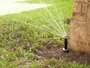 pop up sprinkler head fails to provide proper irrigation coverage to yard